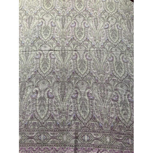 311 - A Victorian paisley shawl. 165cm x 180cm.