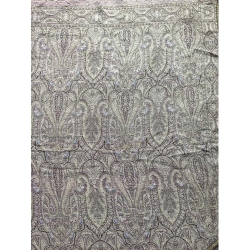 311 - A Victorian paisley shawl. 165cm x 180cm.