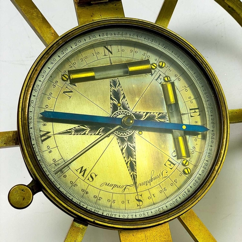 315 - An early 20th century brass navigational /surveying instrument by Troughton London With silvered dia... 