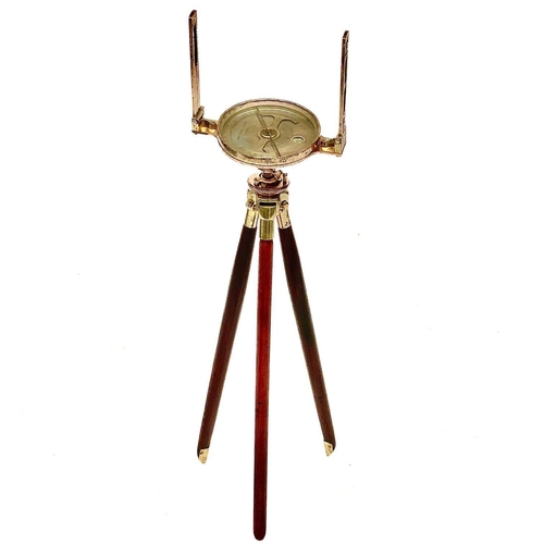 317 - A brass miners dial by Alex Mabon & Co. On tripod stand, dial diameter 17cm.