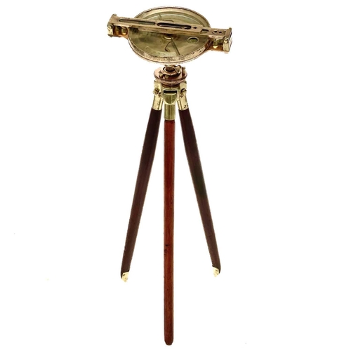 317 - A brass miners dial by Alex Mabon & Co. On tripod stand, dial diameter 17cm.