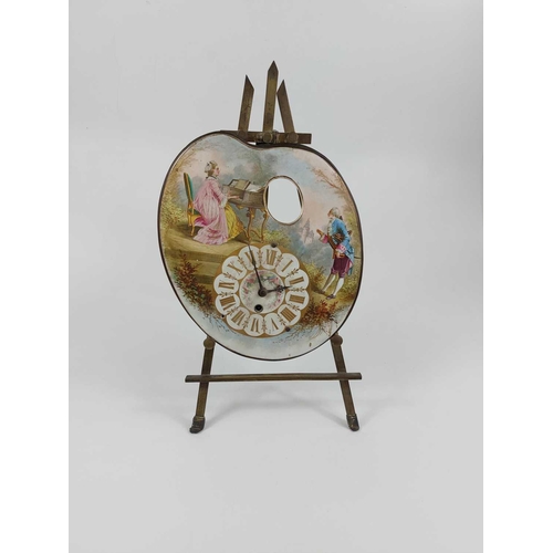 328 - A French artist's palette form easel timepiece. Circa 1880, the dial painted with two Watteauesque f... 