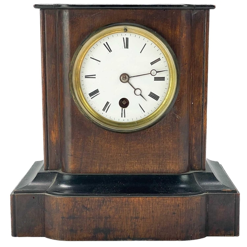 329 - A French walnut cased mantel timepiece. Circa 1880, with ebonised top and moulding, height 21cm.