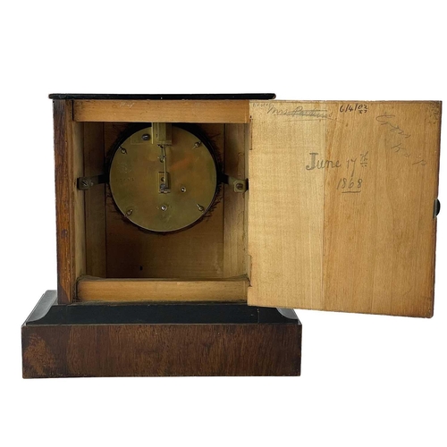 329 - A French walnut cased mantel timepiece. Circa 1880, with ebonised top and moulding, height 21cm.