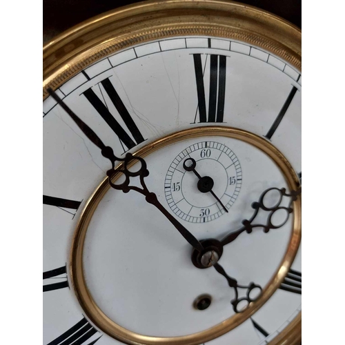 331 - A Vienna regulator type walnut wall clock. Late 19th century, with ebonised mouldings and architectu... 