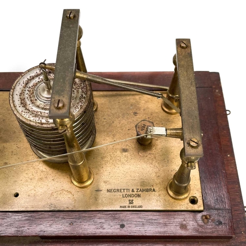 332 - A barograph by Negretti & Zambra. In glazed mahogany case, height 20.5cm.