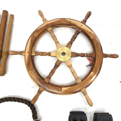 34 - A large collection of reproduction maritime items Including cat 'o' nine tails, rope, block and tack... 