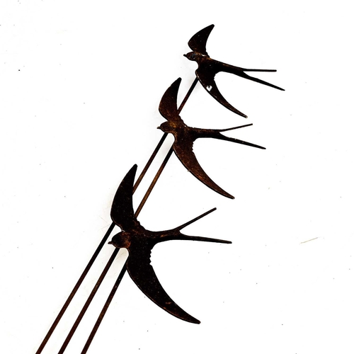 342 - Three wrought iron swallow garden ornaments. Height 160cm.