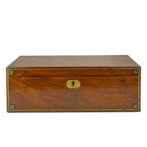 36 - A 19th century mahogany writing box. With brass stringing and inlay, the interior fitted compartment... 