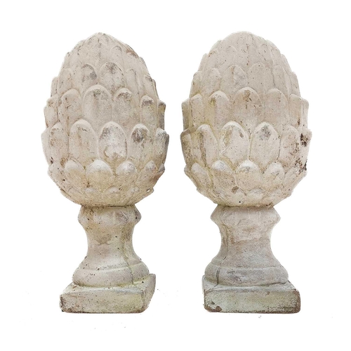 363 - A pair of reconstituted stone finials. Height 29cm.