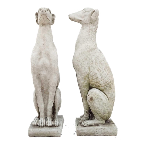 374 - A pair of reconstituted stone whippets. Height 54cm, width 14.5cm, depth 18cm. There are no conditio... 