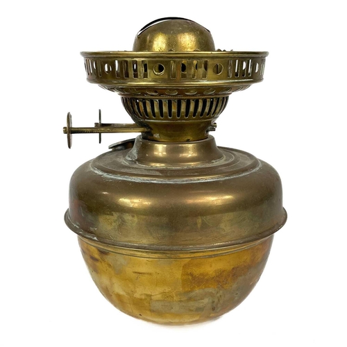 38 - A Victorian wall mounted brass oil lamp. With moulded glass shade, length 35cm, together with a pair... 