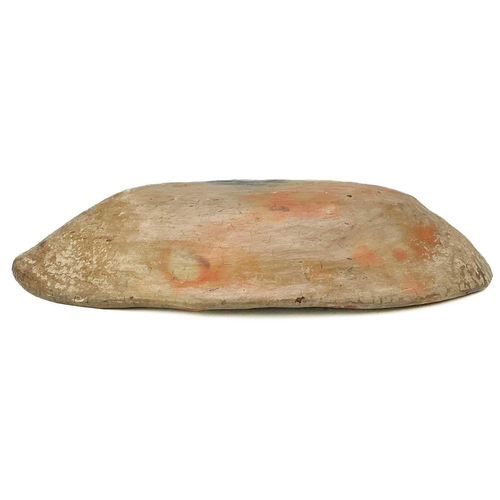 415 - A primitive pottery bowl. Probably South American, painted with a stylised fish with a red glaze, wi... 