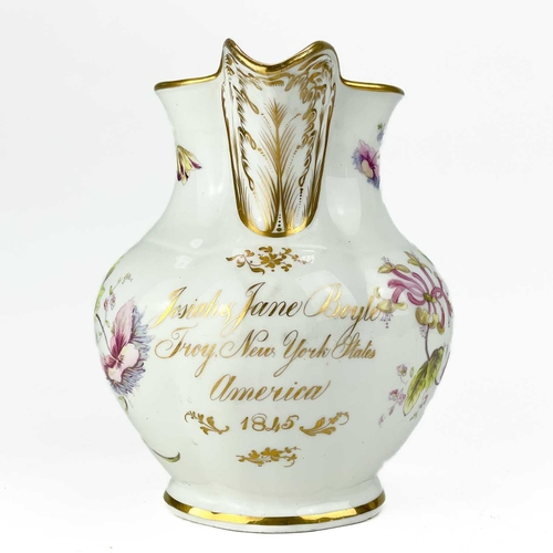 419 - A Staffordshire documentary porcelain jug for the American market. Painted with flowers and inscribe... 