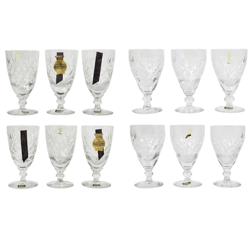 427 - A set of six Webb Corbett cut crystal wine glasses. Height 13cm, boxed, and another similar boxed se... 