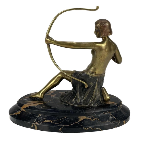 43 - An Art Deco bronze figure of Diana on black marble base. Cold painted, stamped BK? Somme Salon des B... 