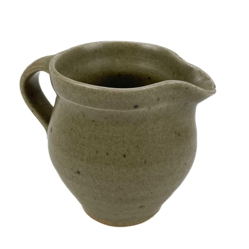 430 - A Leach Pottery standard ware jug. Impressed marks, height 21.5cm, together with four other Leach Po... 