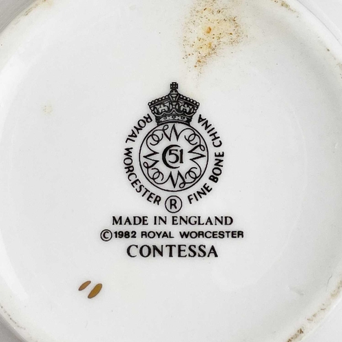 439 - A Royal Worcester Contessa six-place dinner and coffee service. Comprising, two circular vegetable t... 