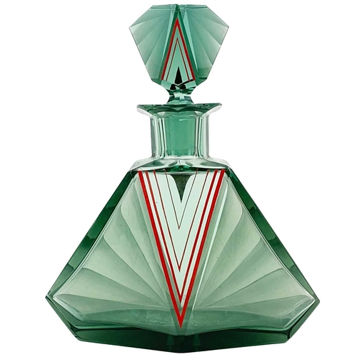 447 - An Art Deco green glass decanter and stopper. Of angular form, with white, red and gilt painted deco... 