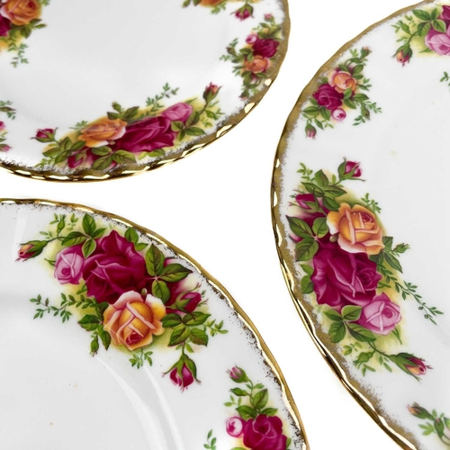 449 - A Royal Albert Old Country Roses part service. Comprising: Two twin handled circular tureens, sauceb... 