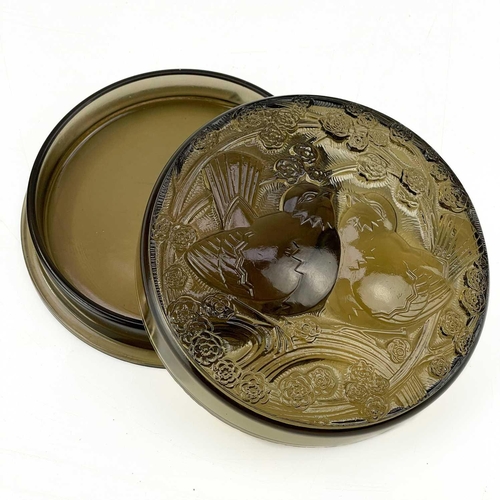 458 - A J. D'Avsen French Art Deco glass circular box and cover. Moulded with two birds and prunus blossom... 