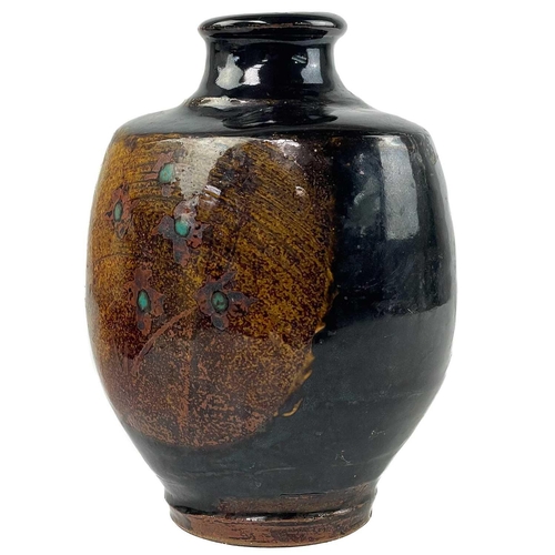 460 - John Bedding (1947), a studio pottery vase. Painted with panels of stylised flowers, impressed mark,... 