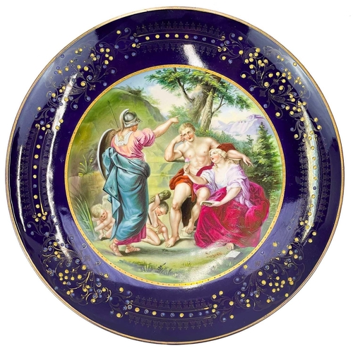 461 - A Vienna type porcelain plate. Circa 1900, painted with a classical scene with Hercules, within a je... 