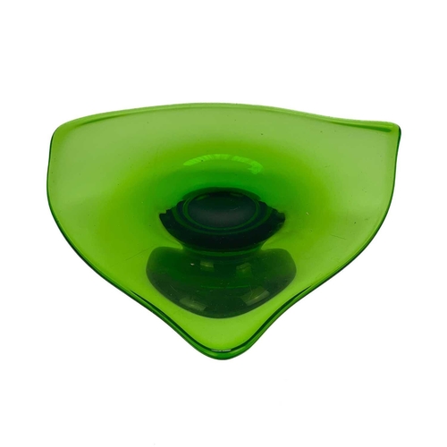 467 - A green art glass small tazza. With an irregular shaped edge, on a circular foot, height 5.5cm, toge... 