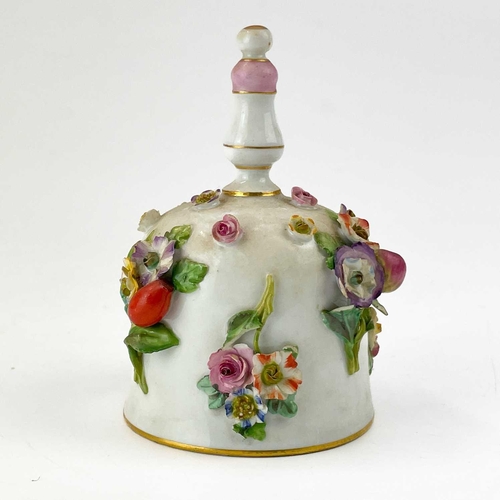 470 - A Meissen porcelain floral encrusted table bell. Blue crossed swords mark, height 11cm, together wit... 