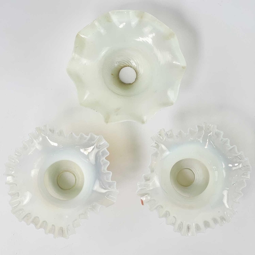 476 - A pair of Vaseline glass shades. With frilled edges, diameter 18.5cm, together with another similar ... 