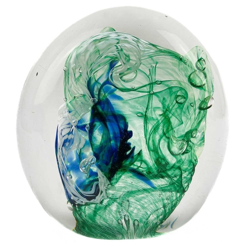 485 - Norman Stuart Clarke (b.1944). A studio glass paperweight decorated with four flowers, signed and da... 