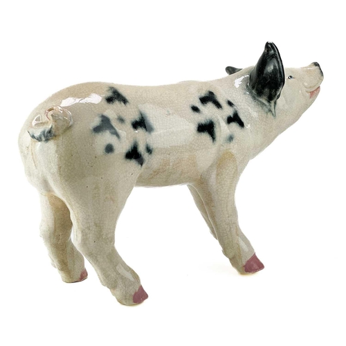 488 - A studio type large crackle glazed figure of a pig. With black and white markings, height 37cm, leng... 