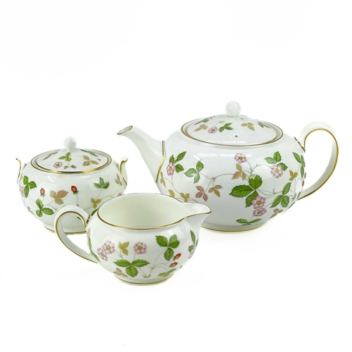 490 - A Wedgwood wild strawberry tea service. Comprising: teapot and cover, twin handled sucrier and cover... 