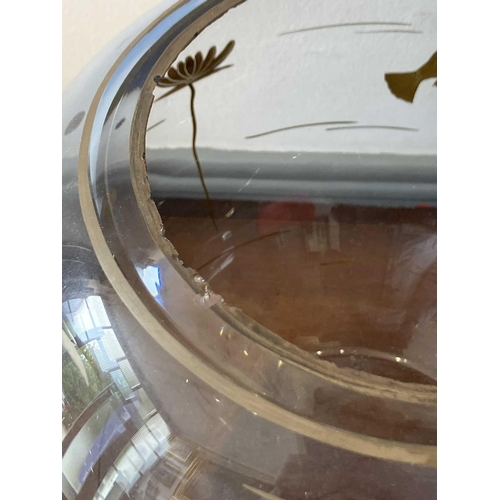 499 - A French glass fish bowl. Mid 20th century, decorated in silver lustre with fish and pond plants, he... 