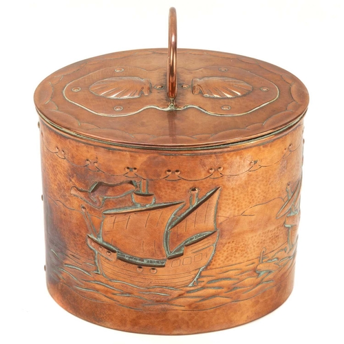 5 - A Newlyn copper oval tea caddy. The pull off cover with loop handle and two shells, the main body re... 