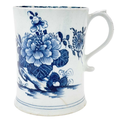 501 - Lowestoft porcelain tankard. Decorated in blue and white with flora and fauna in a rocky landscape, ... 