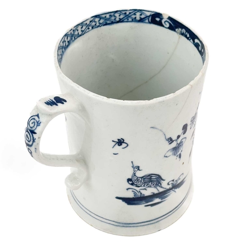 501 - Lowestoft porcelain tankard. Decorated in blue and white with flora and fauna in a rocky landscape, ... 