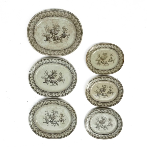 504 - A graduated set of nine Victorian meat plates. With seaweed decoration, the smallest plate measures ... 