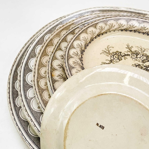 504 - A graduated set of nine Victorian meat plates. With seaweed decoration, the smallest plate measures ... 