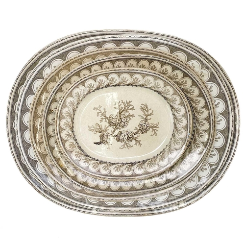 504 - A graduated set of nine Victorian meat plates. With seaweed decoration, the smallest plate measures ... 