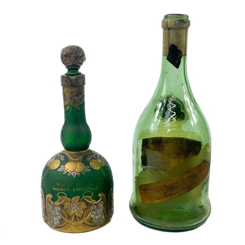 507 - A Daum glass Grand Marnier bottle. Decorated in enamels height 21cm, together with a Napoleon brandy... 