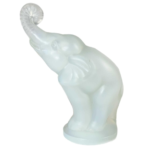 518 - A Sabino opalescent glass elephant mascot. With raised trunk, etched mark, Sabino Paris, height 11cm... 