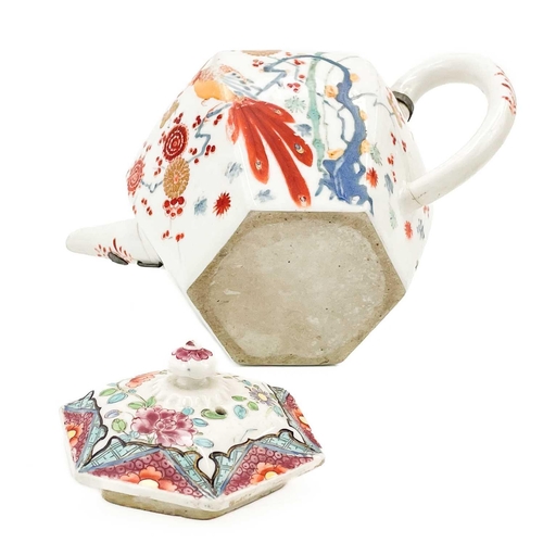 523 - A Chelsea porcelain hexagonal teapot in the Kakiemon palette 1750-3. With associated lid, height 12.... 