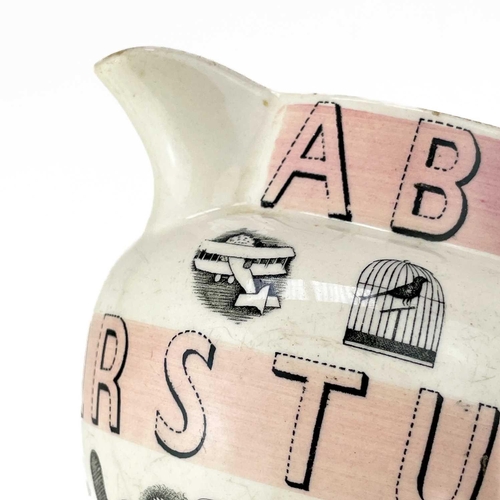 528 - A Wedgwood alphabet jug, by Eric Ravilious. Decorated with bands of pink, height 10.5cm. There is a ... 