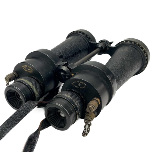 53 - A pair of WWII era Barr & Stroud 7X CF 41 Naval binoculars. With telescopic rain shields and a leath... 