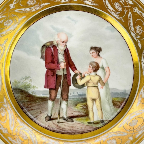 532 - An early 19th century porcelain cabinet plate. Well painted in polychrome with two children and an e... 