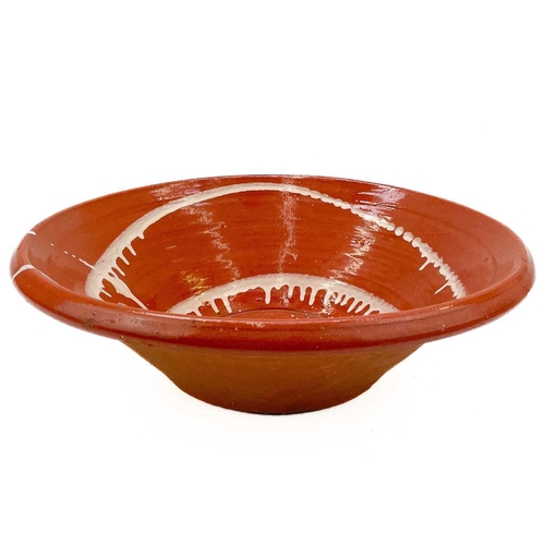 540 - A terracotta glazed pancheon. With a spiral design, diameter 40cm.