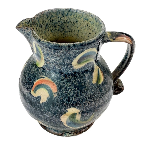 548 - Paul Jackson (1954) Ceramic jug decorated with sunflowers, height 14cm together with another two Pau... 