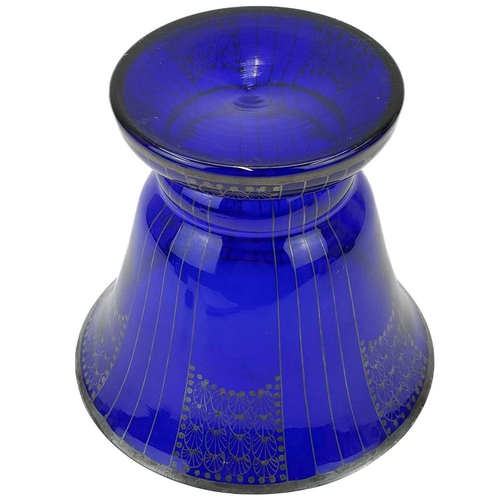 554 - An Austrian blue glass vase with secessionist style gilt decoration. Cira 1930, height 14.5cm.