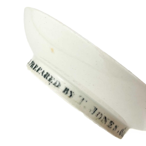 562 - A small documentary creamware dish. Circa 1810, inscribed to the footrim 